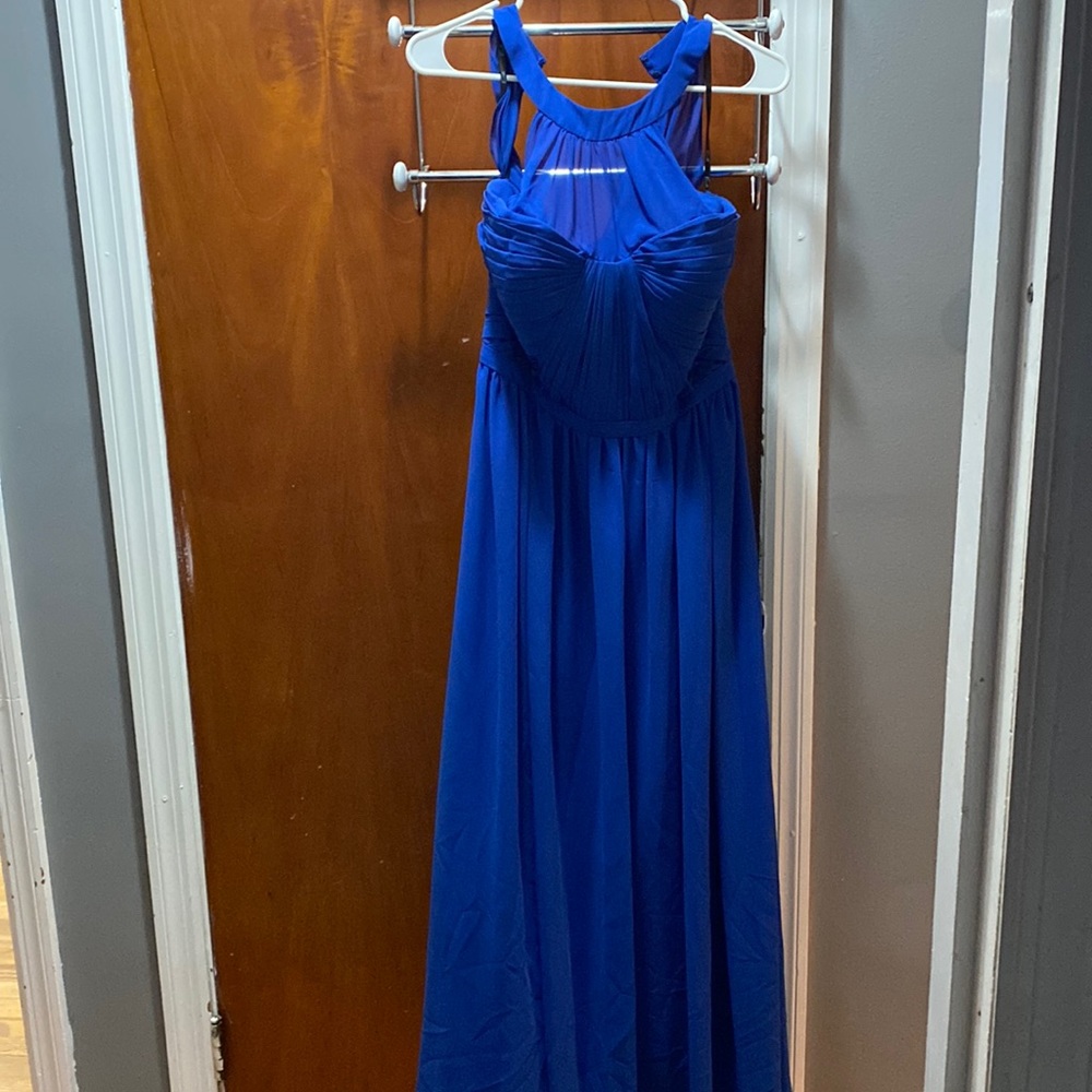Blue gown with key hole in the back. Sheer top. Size 12P